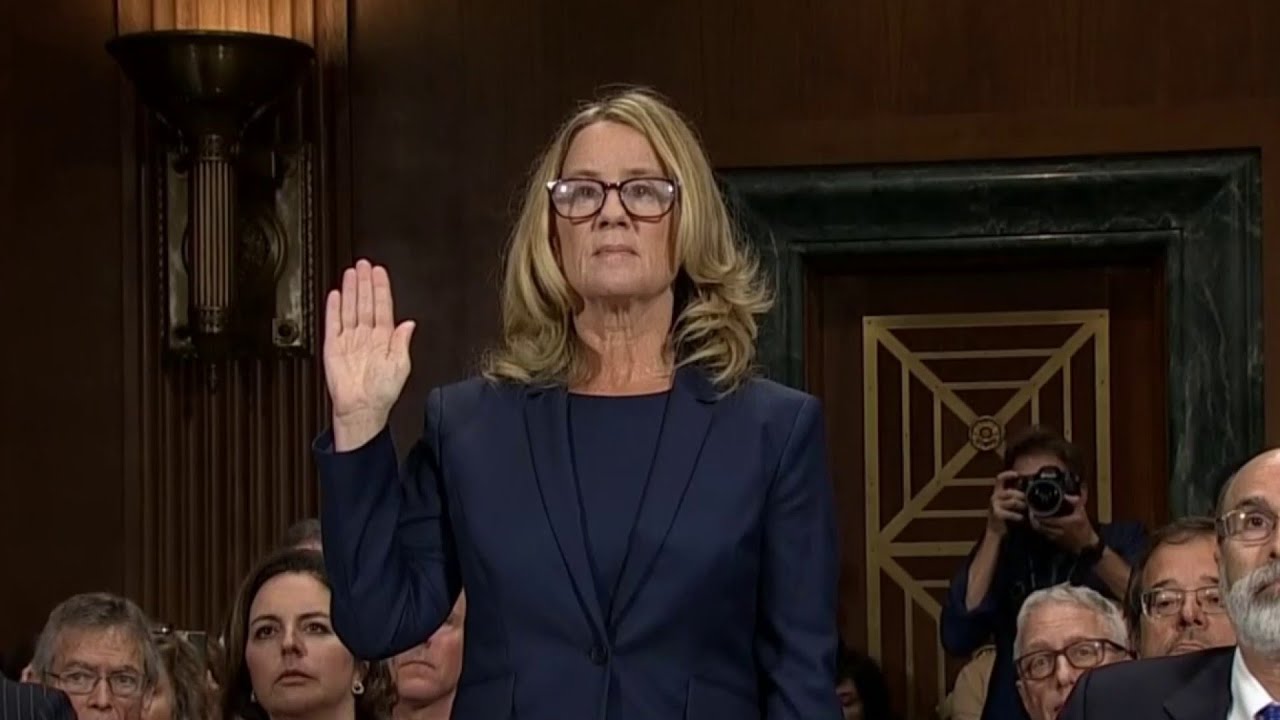 Christine Blasey Ford is sworn in before testimony about Kavanaugh