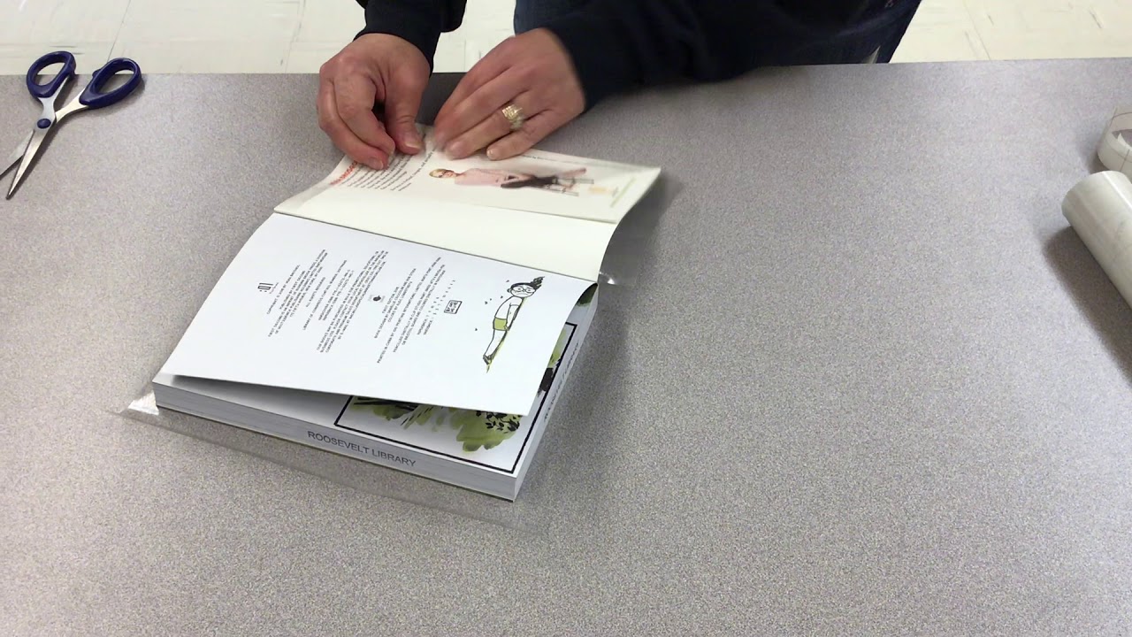 How to cover a paperback book with laminate