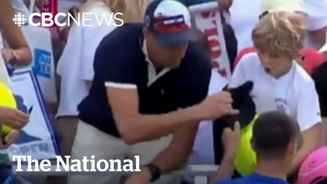 CEO apologizes for taking hat from boy at U.S. Open