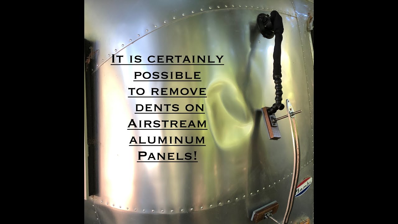 Airstream dented aluminum panel repaired using Paintless Dent Repair and a DentDial 24HeavyDuty.