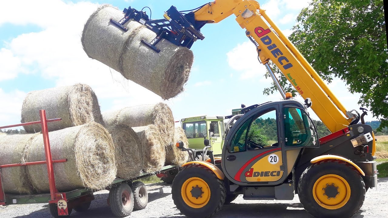 MB Trac 900 Turbo - Heu Bergung - Dieci mit Ballengreifer W500 Mailleux
