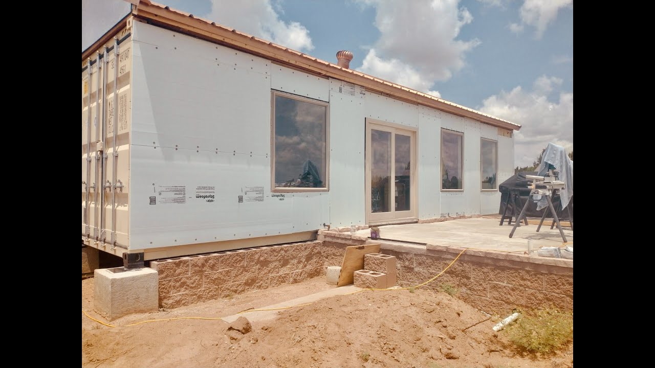 SHIPPING CONTAINER HOME #23 (OUTSIDE INSULATION) - INSULATING OUTSIDE OF CONTAINER