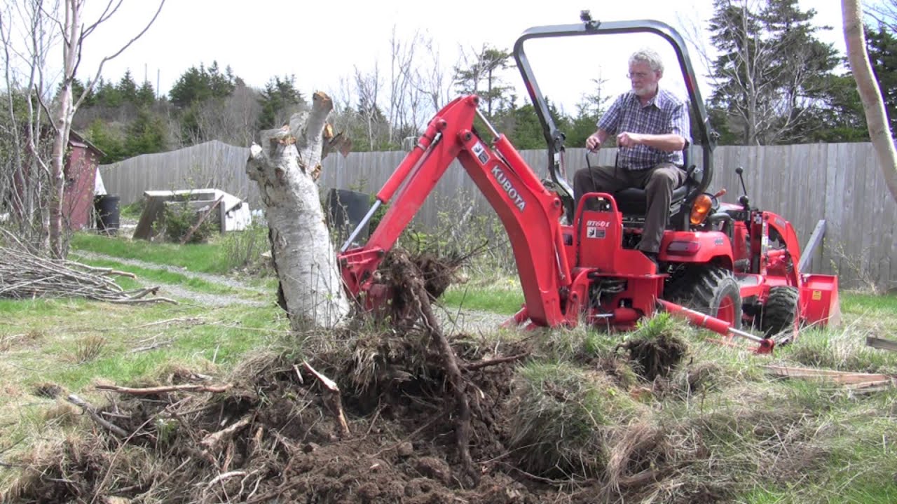 Removing tree stump with Kubota BX