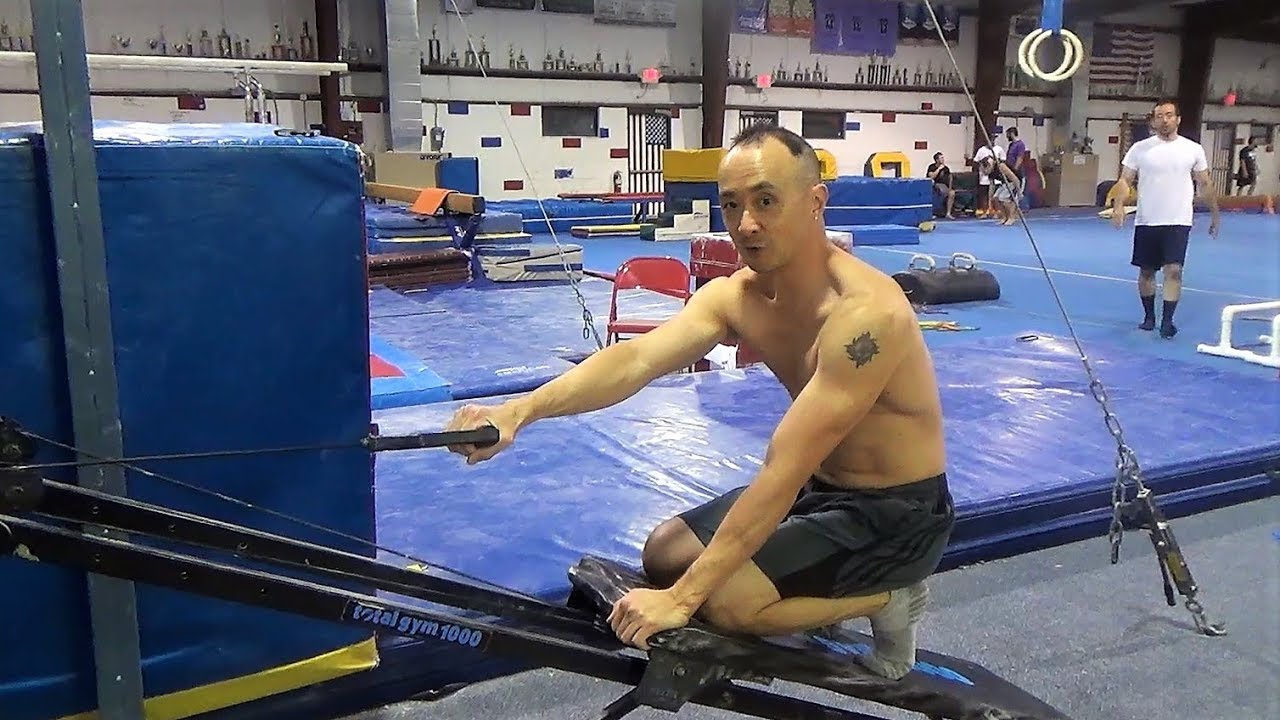 SINGLE ARM TWISTING CABLE ROW ON THE TOTAL GYM - Gymnastics Fitness and Bodybuilding Workouts