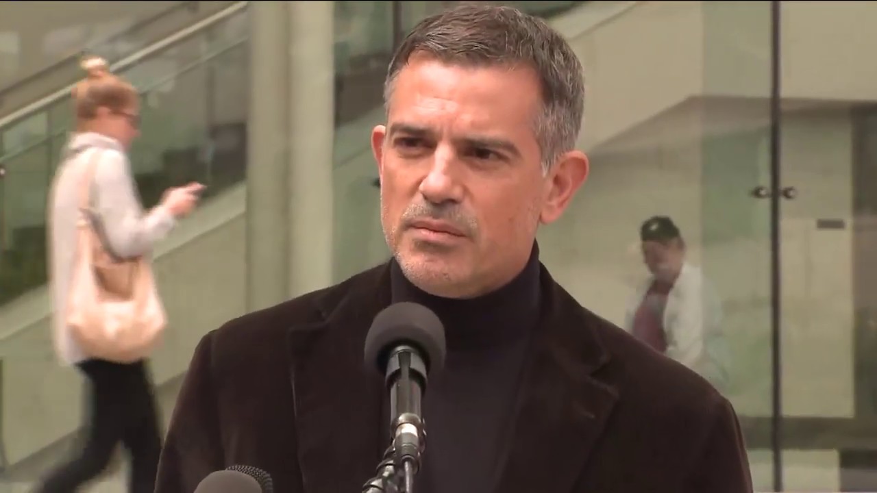 Fotis Dulos speaks outside court, lawyer zips his lips