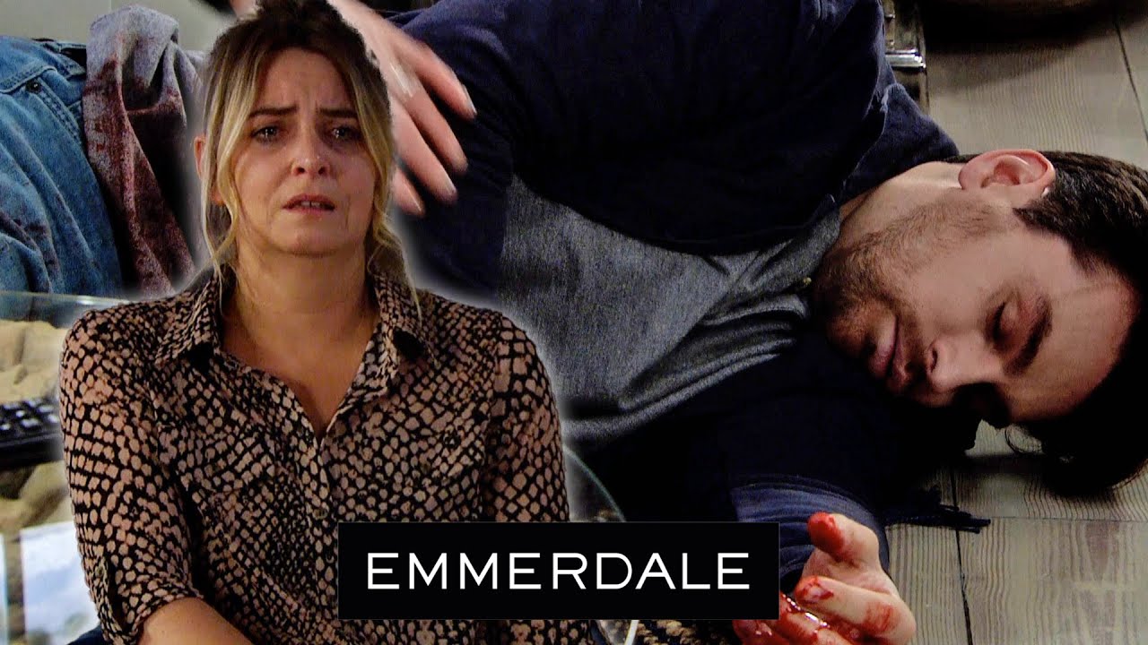 Moira Finds Mack Bleeding In Front Of Charity | Emmerdale
