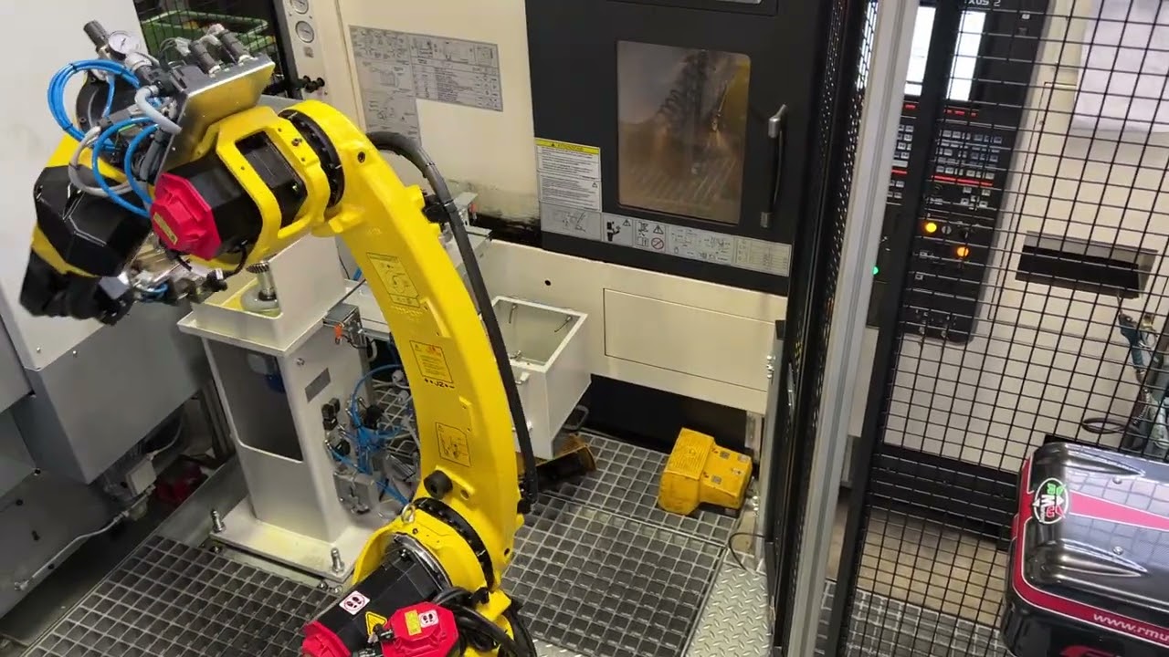 Robot cell tending 2 machine tools with marking and centrifuge