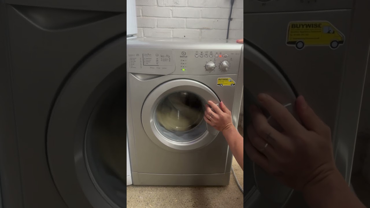 INDESIT VS 2.5KG WEIGHT (HITS THE GLASS ALL AROUND)