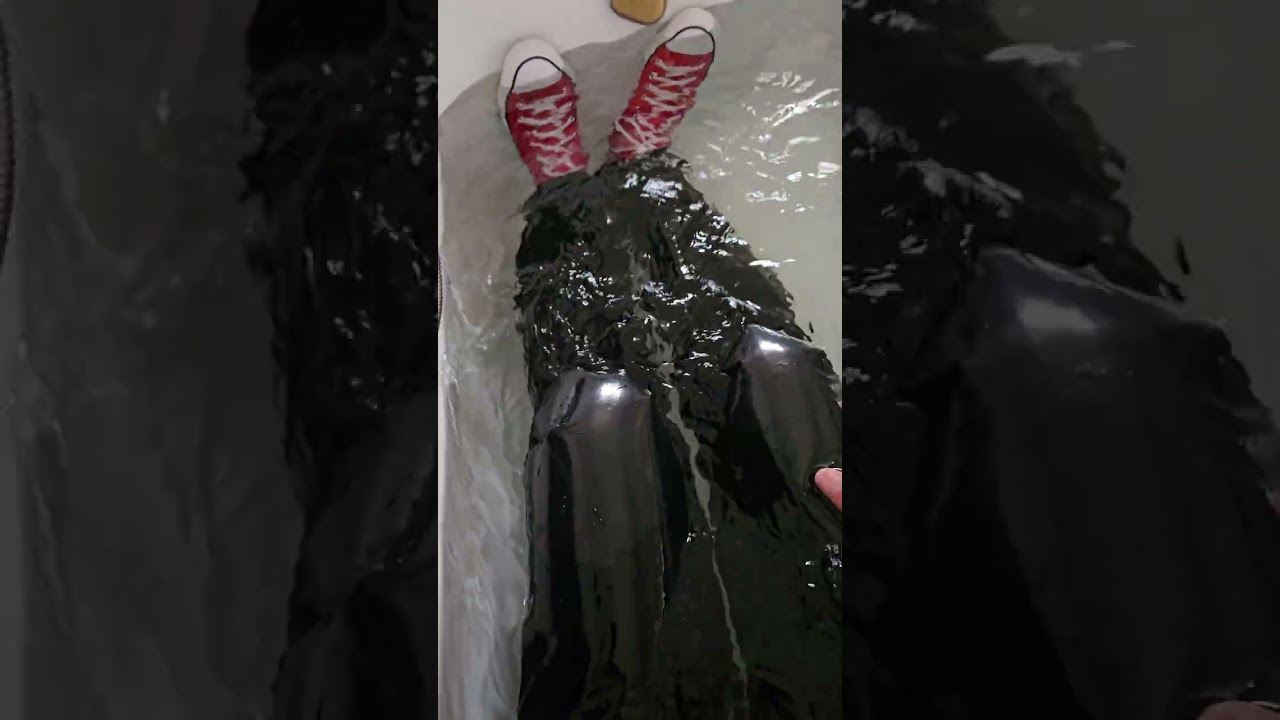 bath in converse and vinyl jeans