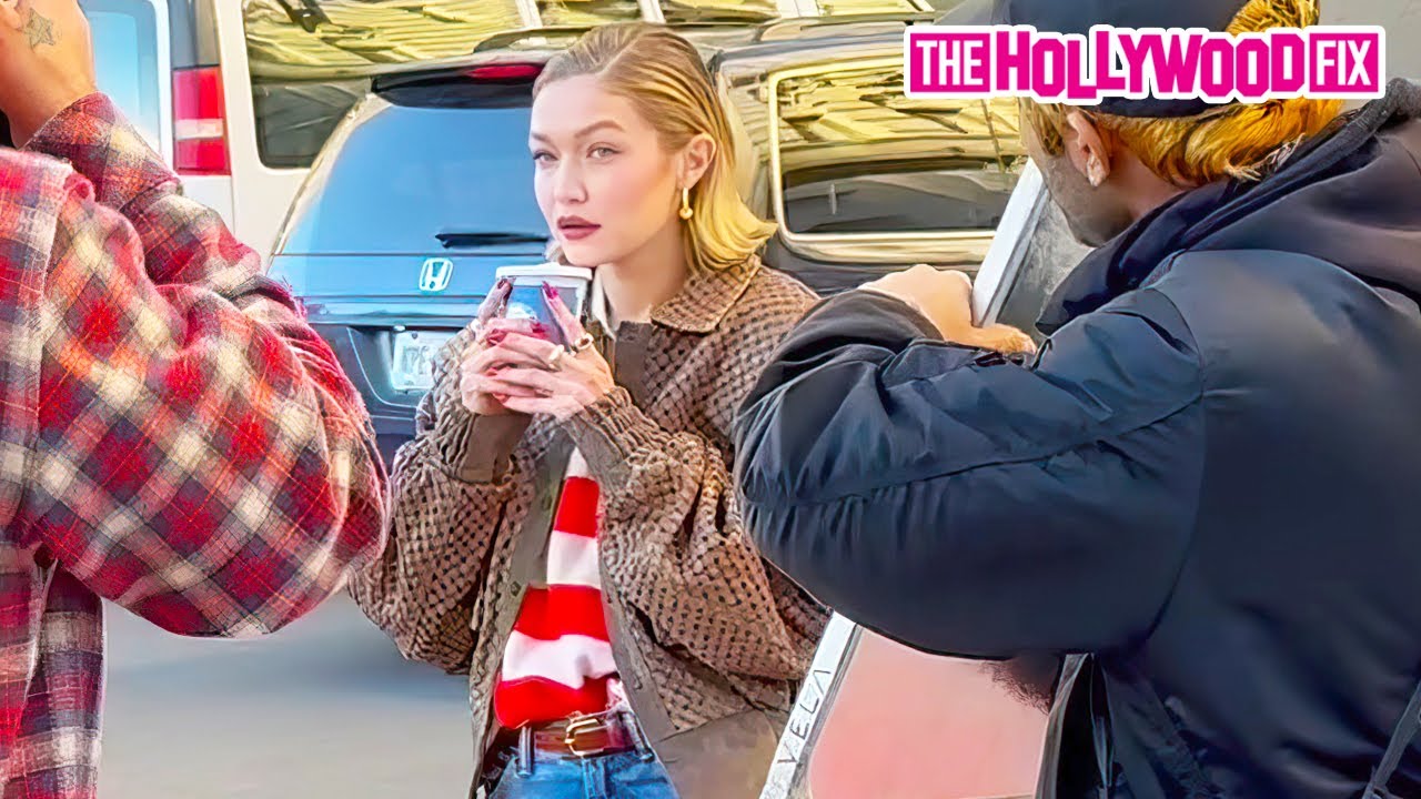 Gigi Hadid Stuns In A Leather Jacket & Blue Jeans While Modeling For Maybelline In The Streets Of NY