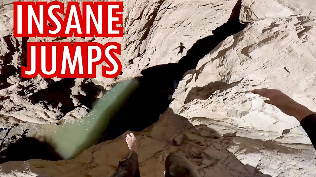 INSANE CLIFF JUMPS INTO NARROW CANYON