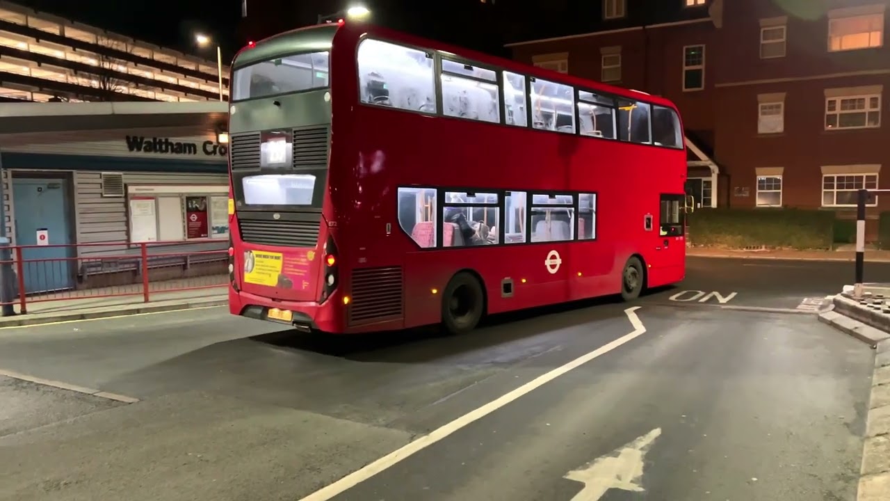 Buses in action at night in Waltham Cross on 17th January 2023
