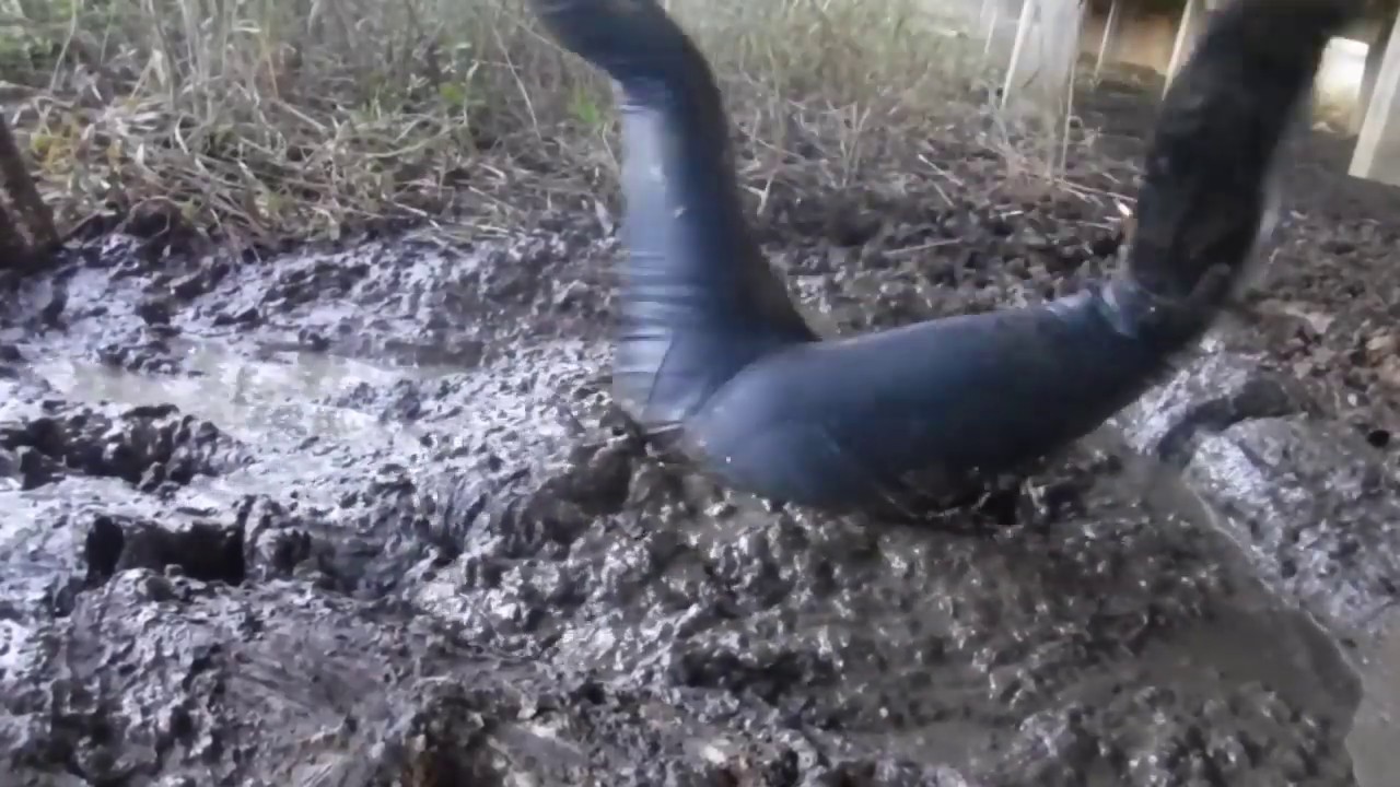 Leather leggings and boots in Mud