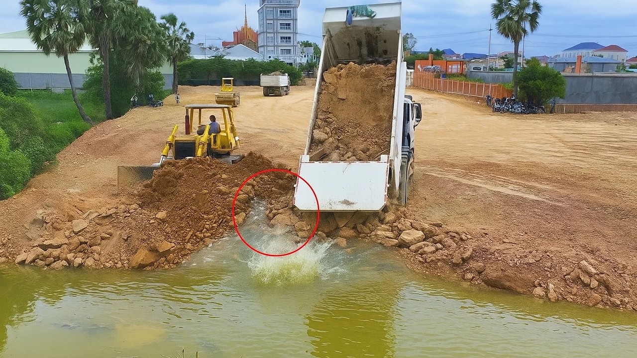 Best Incredible Making Road to Middle of Lake by KOMATSU Dozer with 25 Ton Truck