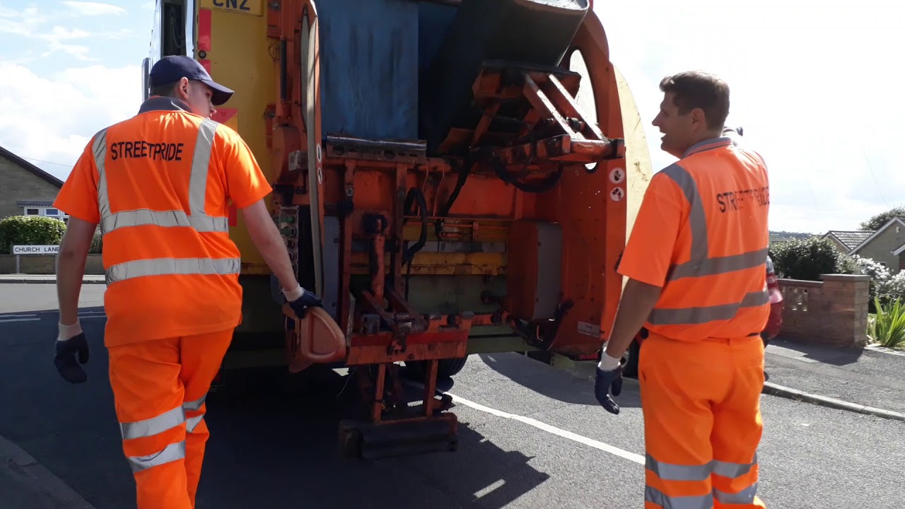 Merdeces benz econic bin lorry with a terbeg lift collecting green bin