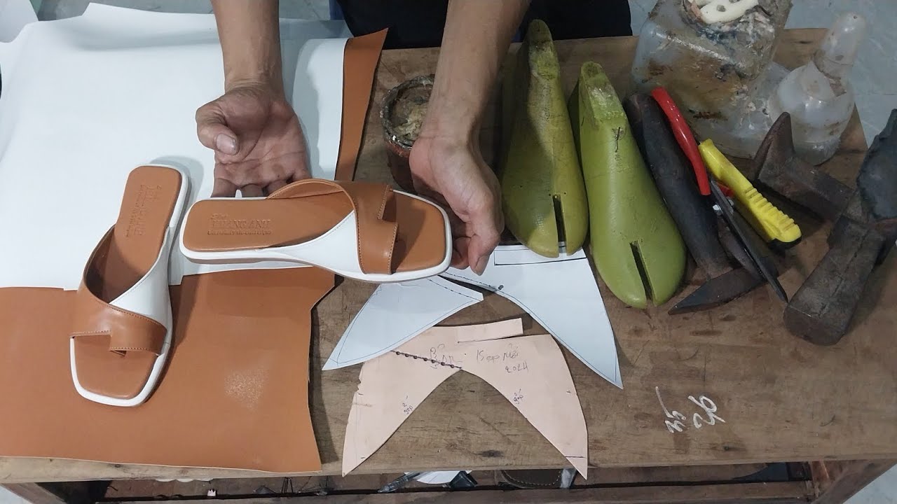 Share the secret of making a pair of white and tan handmade sandals.