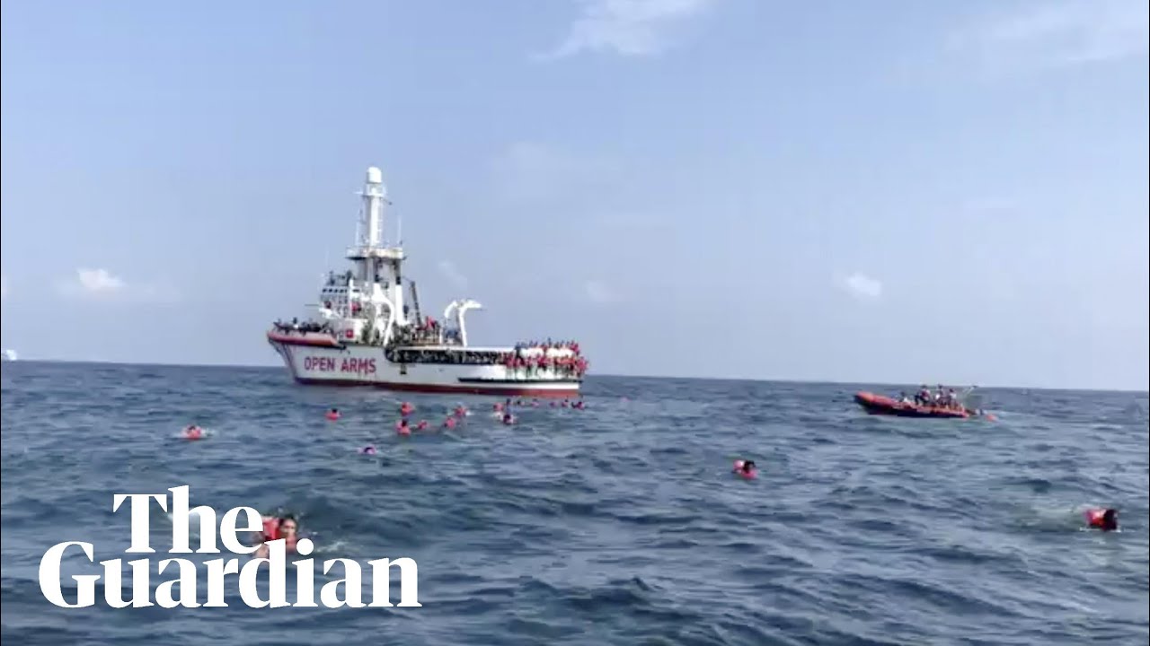 Dozens jump from NGO rescue ship in attempt to reach Sicily