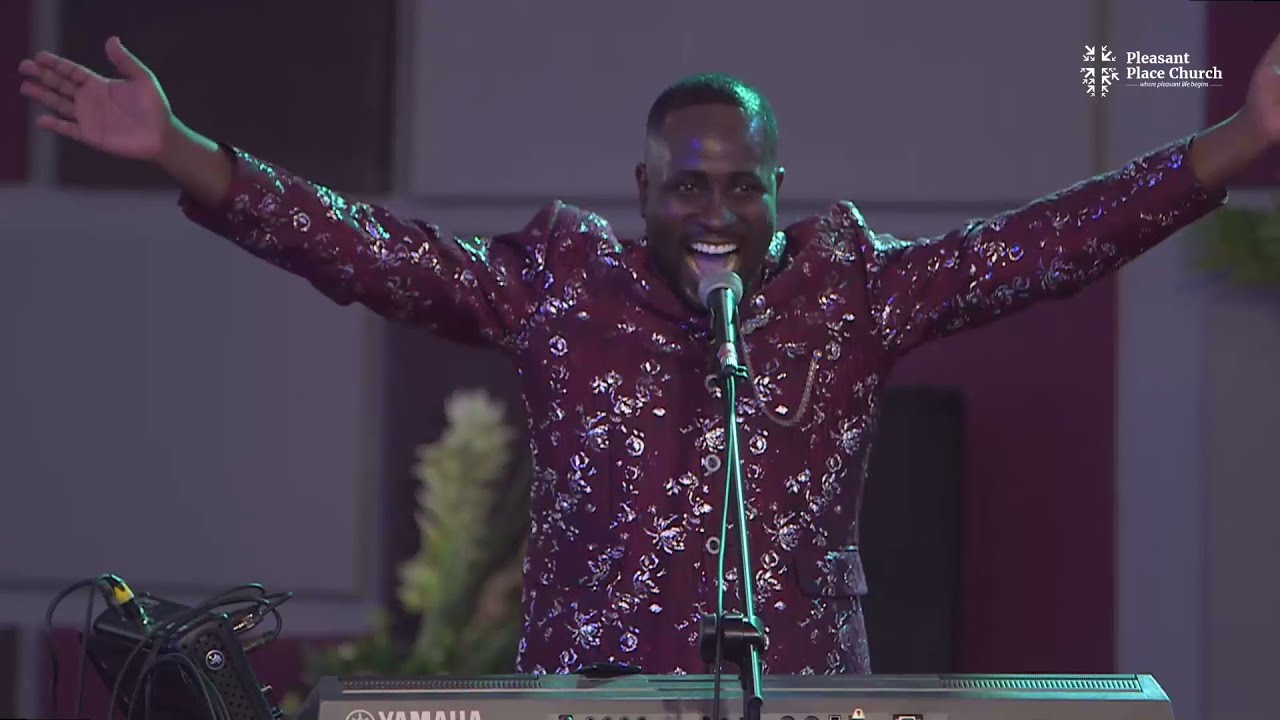 Dr. Alfred Patrick Addaquay ministers at the Pleasant Place Church Mid-Year Thanksgiving Service