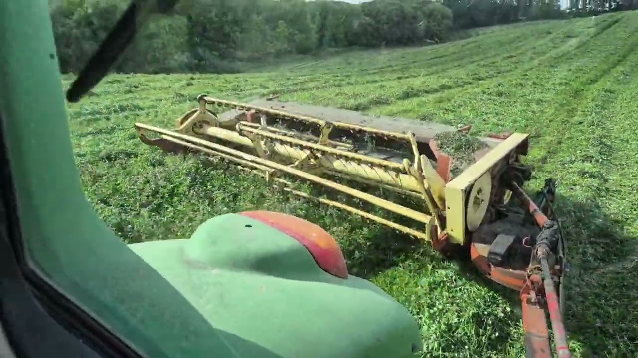 Trying out the Free pull behind swather, that I got from my Grandma B 