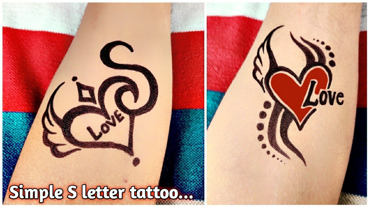 Beautiful and very simple S and love tattoo..
