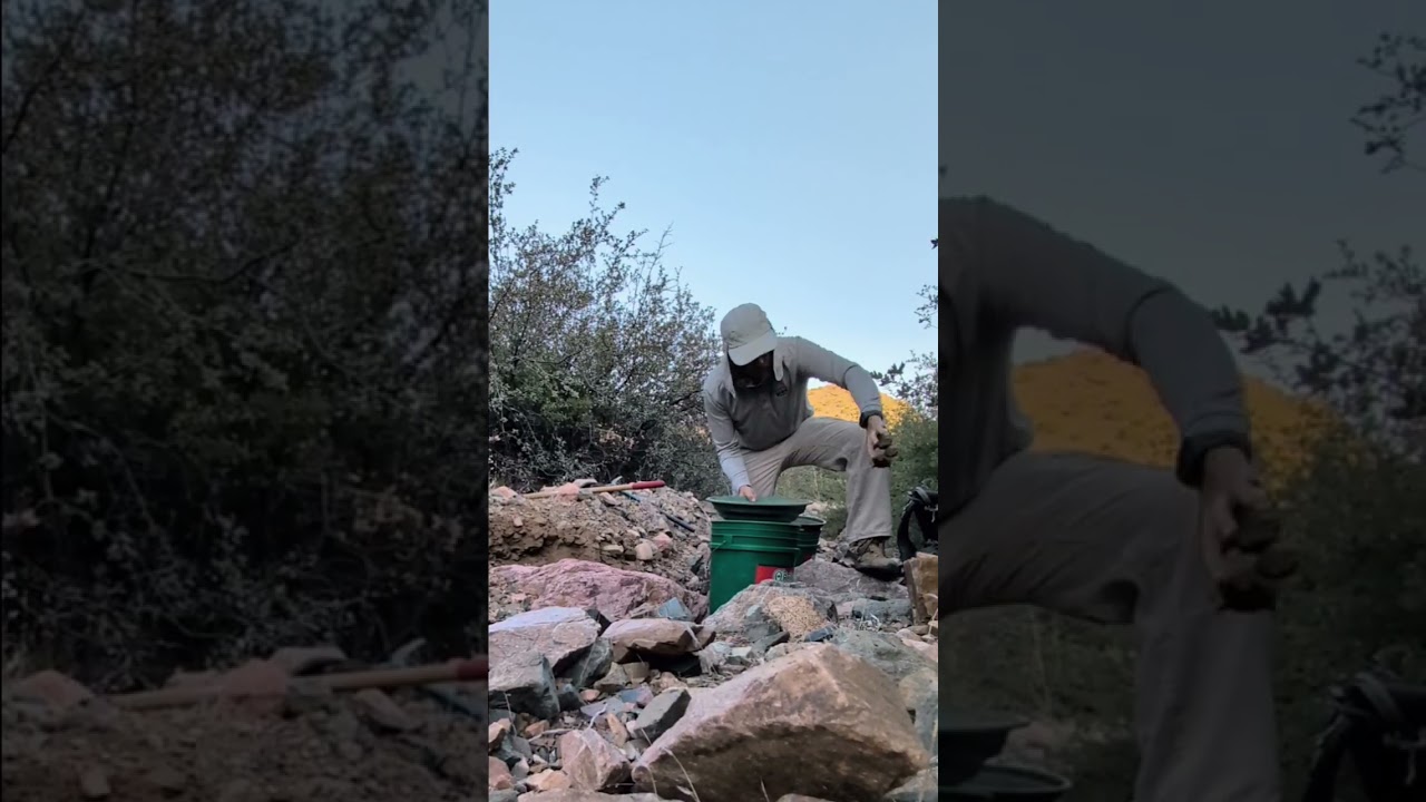 Old school dry panning for Gold.