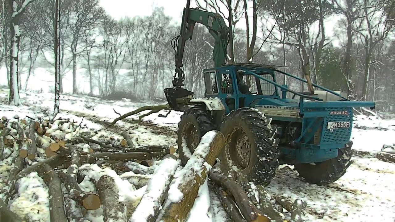 county tractor with forestry crane