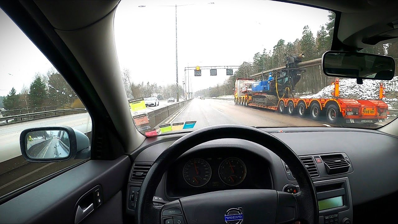 Volvo V50 Driving in the Rain to Södertälje