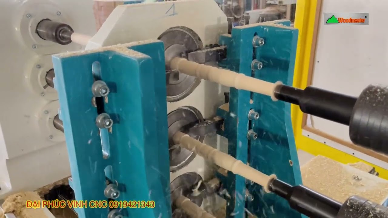 Máy tiện Cnc 3 trục làm việc đồng thời Woodmaster 