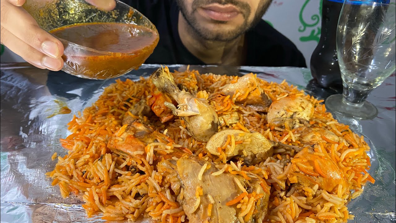 Chicken Biryani with Spicy Gravy and thumbs up