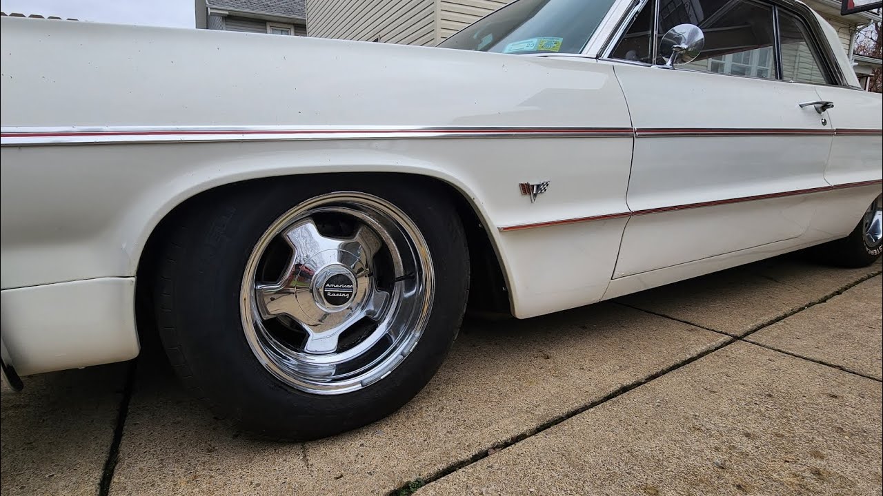 64 Impala on old school 15x7 Hammer rims...