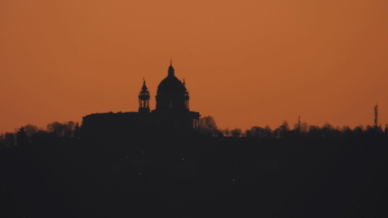 The sun rises over the Basilica of Superga on December 27, 2025.