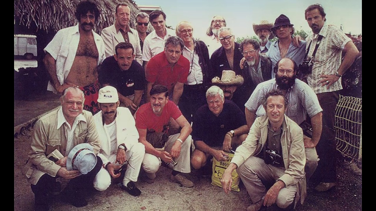 A growing group of the Usual Gang of Idiots from MAD Magazine visits Tahiti in 1974
