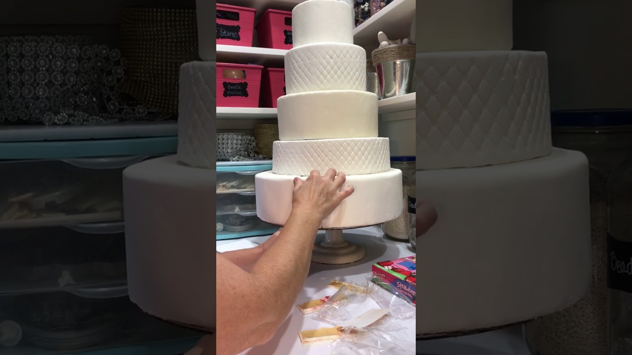 Faux wedding cake cutting