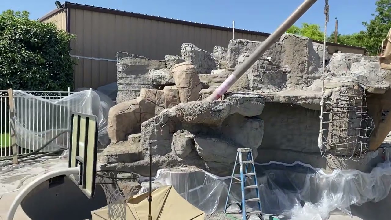 Artificial rock waterfall construction