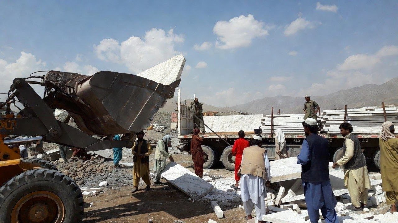 Heavy Loader Unloading Huge Marble Stones from Truck  Marble Factory Process