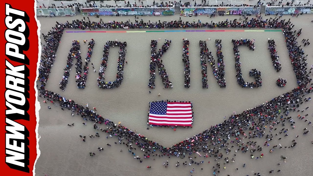 Protesters form into human banner, spelling 'No King!' on San Francisco beach