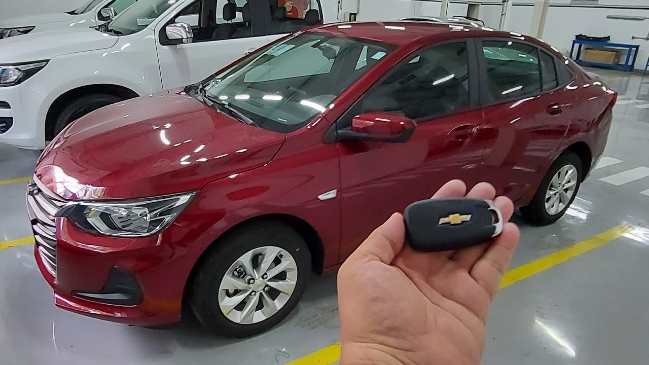detalhes reais novo Chevrolet onix LT sedan manual aspirado lt2 r8h 2022 vermelho carmmim completo