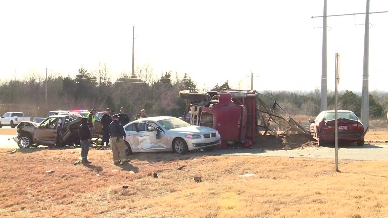 Multiple vehicles involved in crash that overturned truck hauling dirt