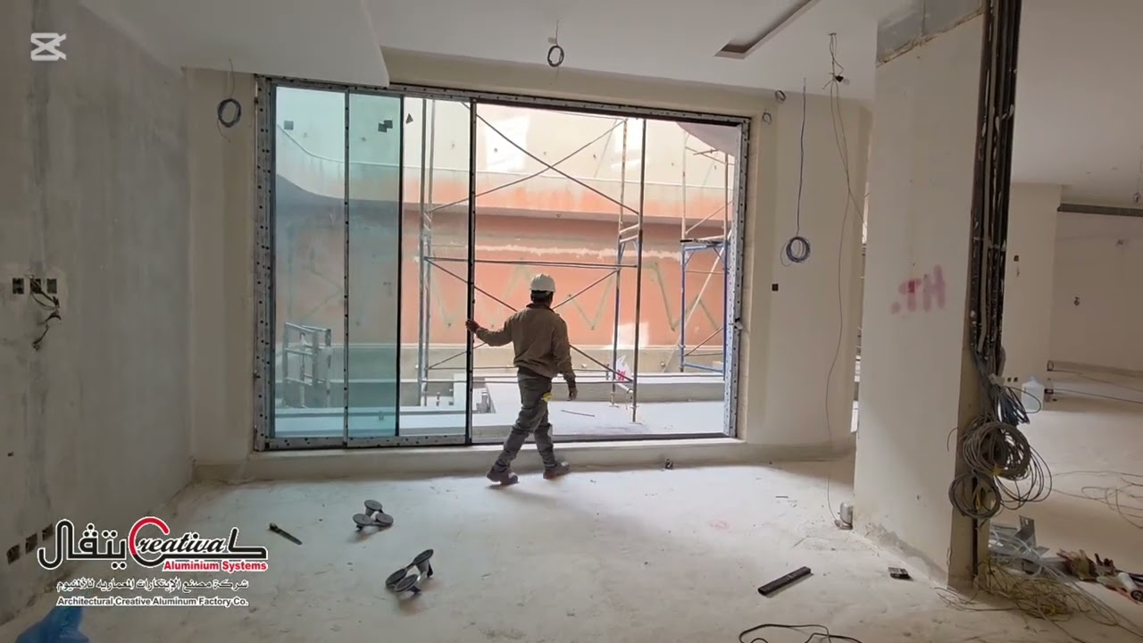 أبواب سحاب بأربعة ضلف على أربعة مجاري4Rail sliding doorللجلسه في القبو بإطلاله على مسبح فيلا-بالرياض