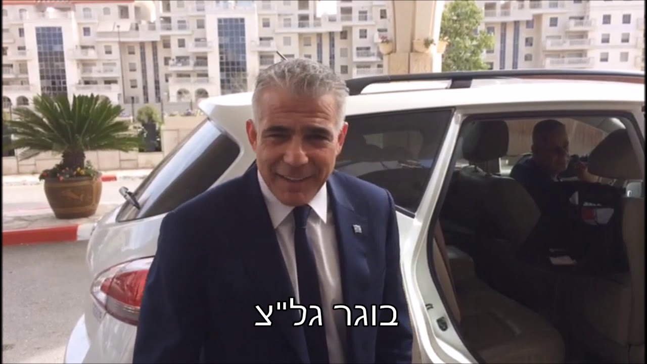 כ