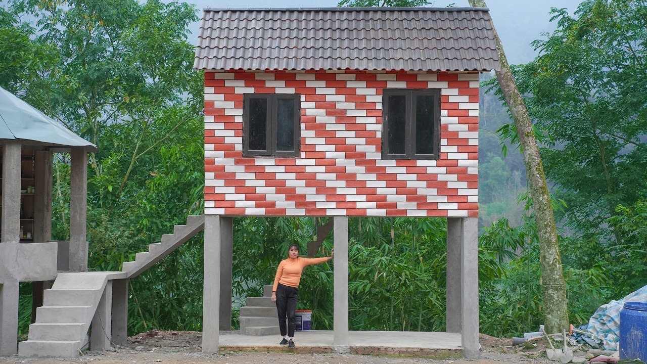 Install white $ red subway tiles to create a stunning zigzag pattern on the wall