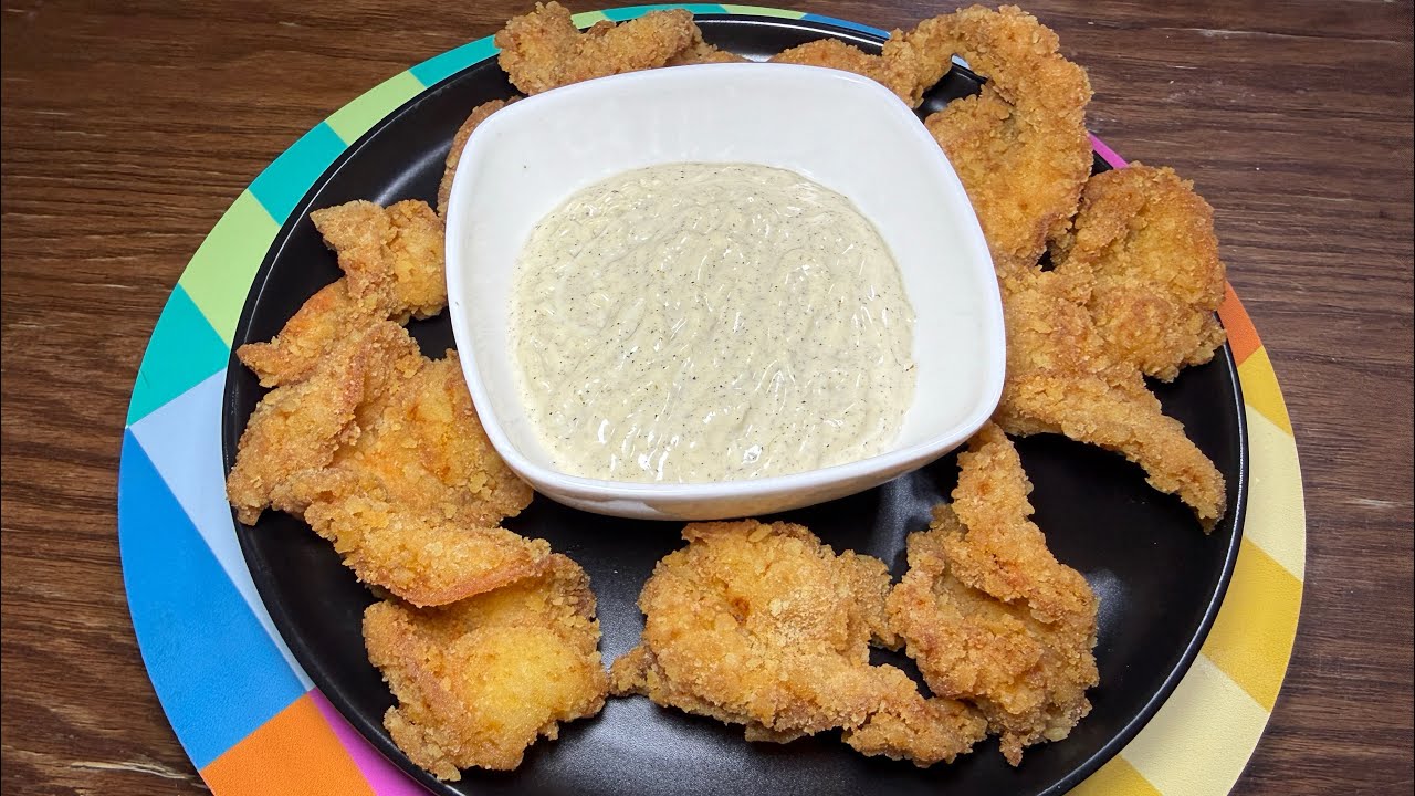Camarones empanizados con un aderezo de habanero tatemado 