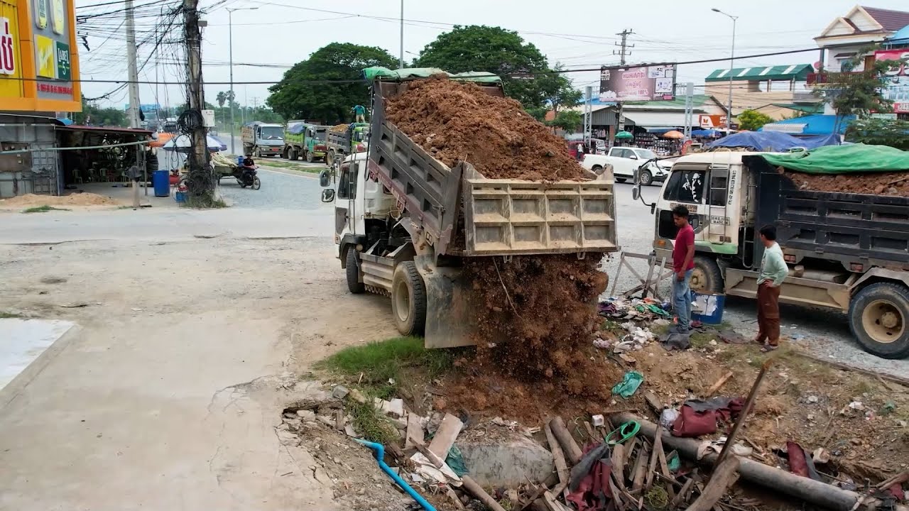 Best Project Dump and And bulldozer covering the Canal
