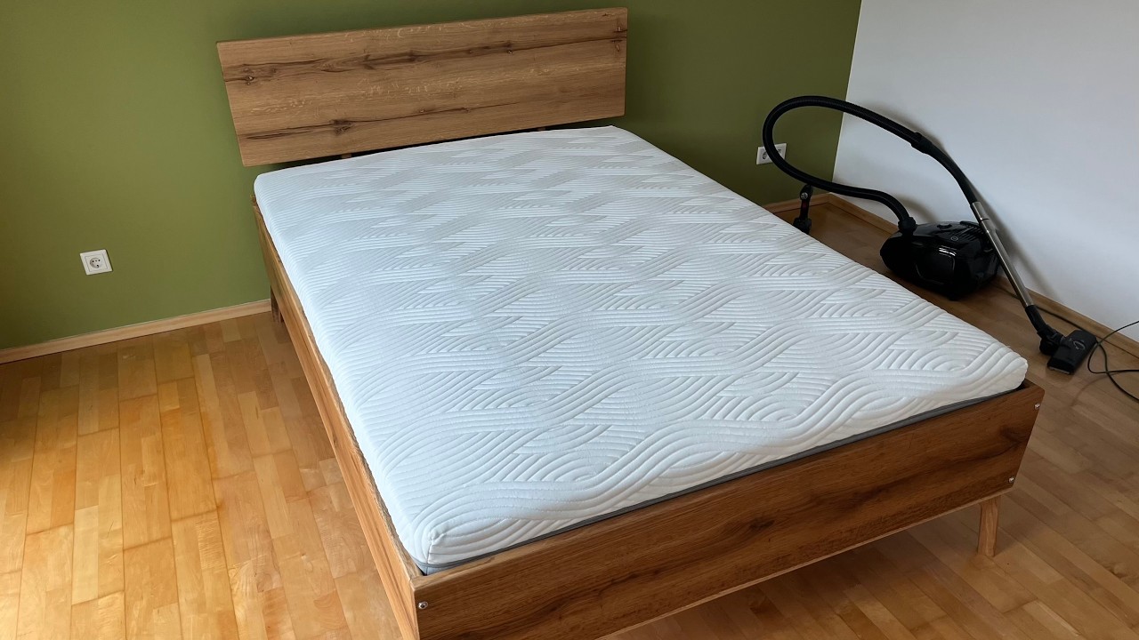 A simple solid oak bed