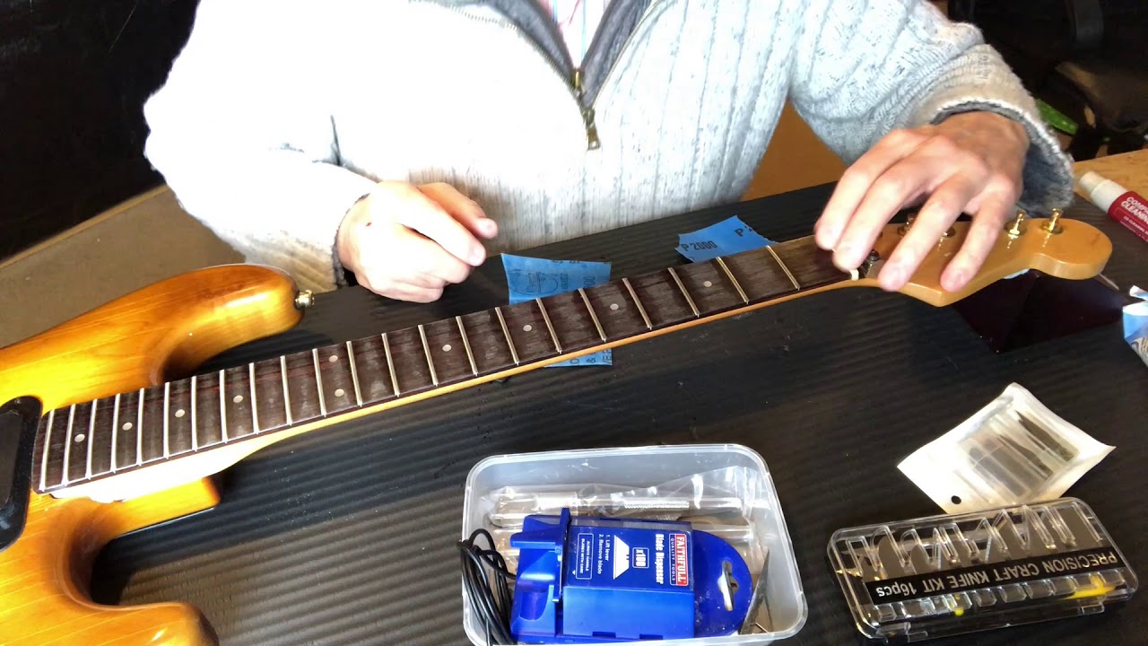 Warmoth Guitar body and a Hondo neck... The owner wanted the low profile frets removed but...