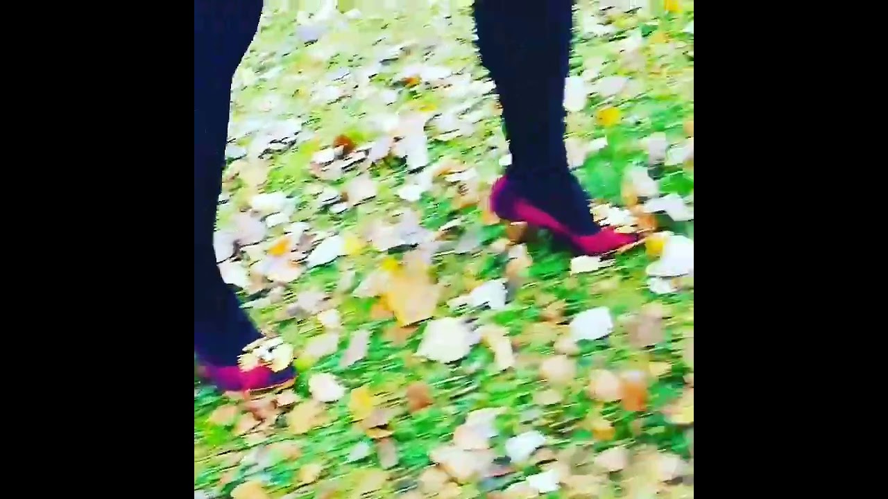 Lady L walking in forest with wooden red sexy golden high heels.