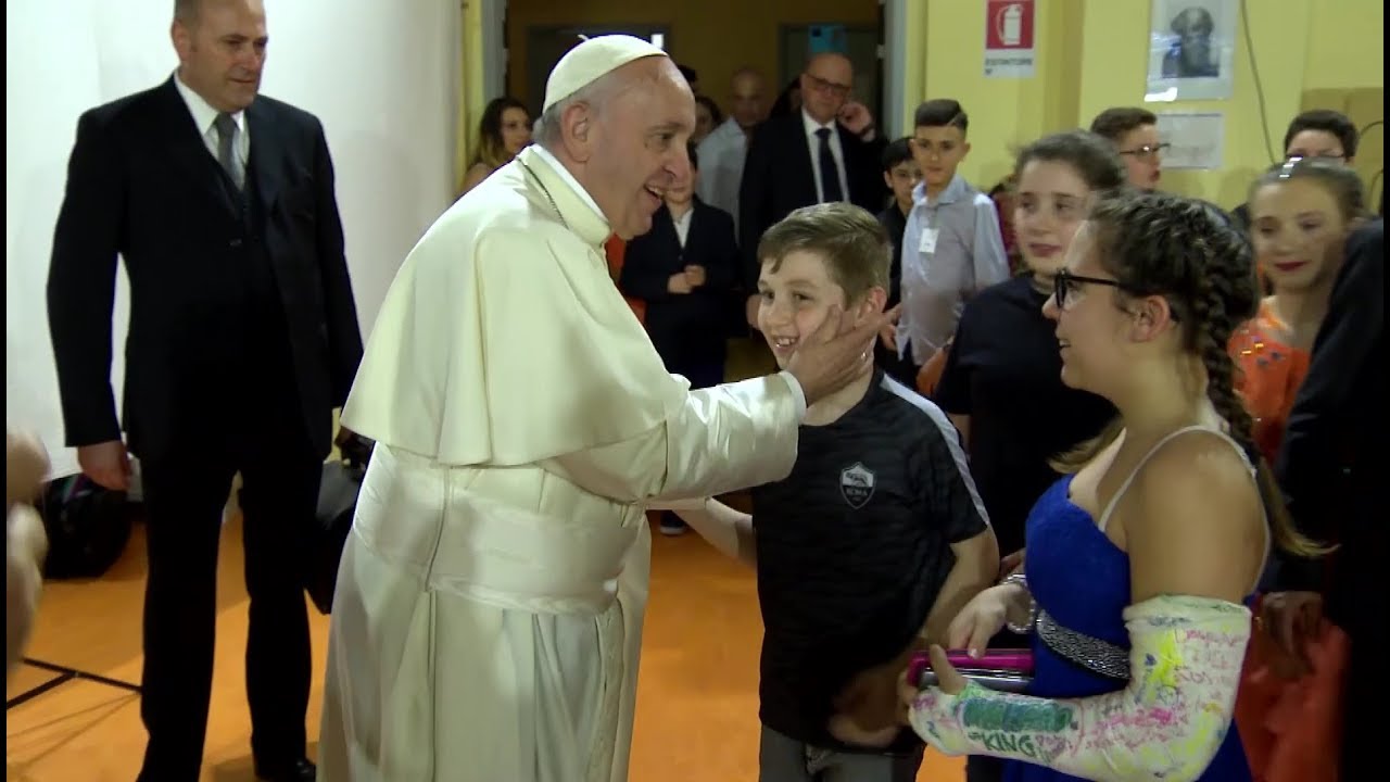 Tears and emotion from students after pope's visit to a school in Rome's periphery
