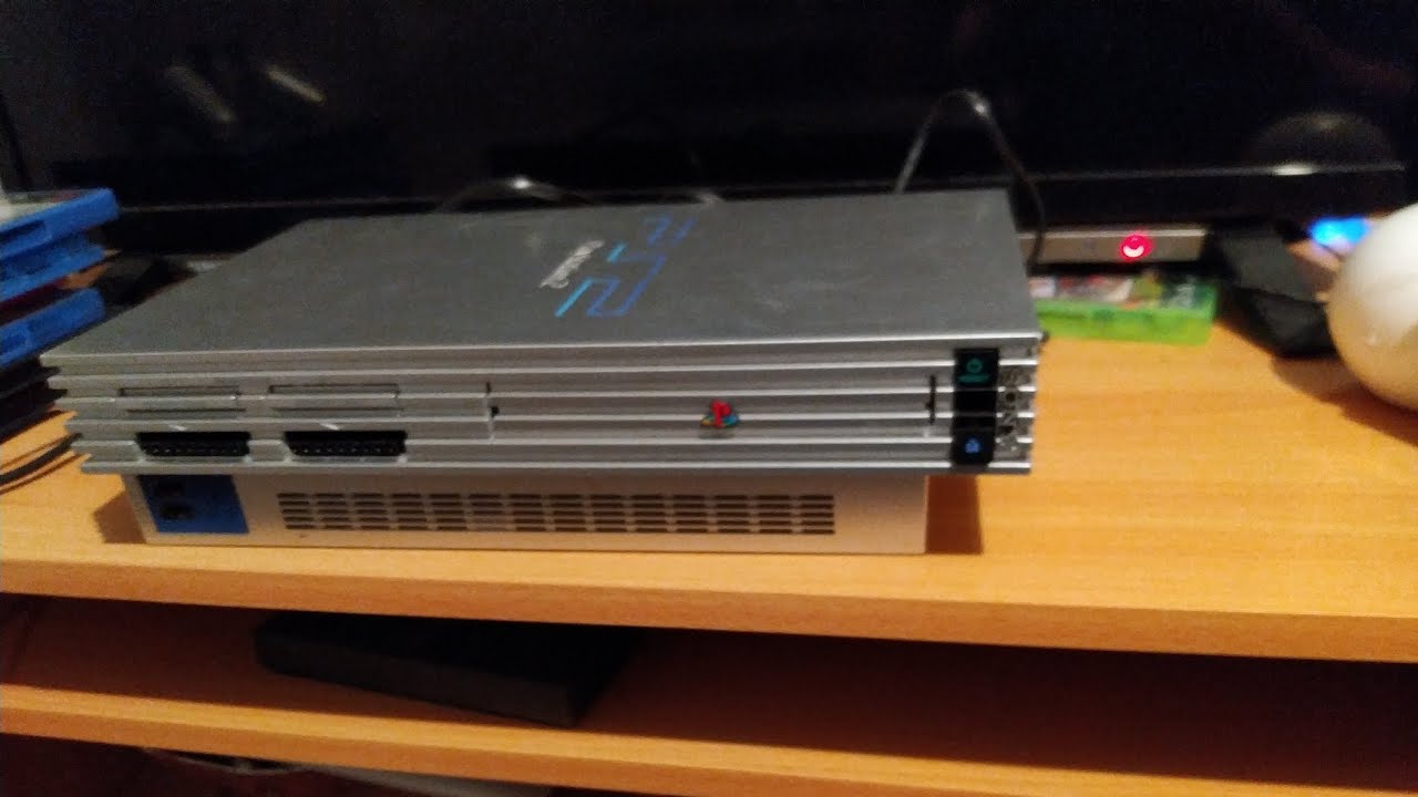 unboxing an original silver PS2 and some games