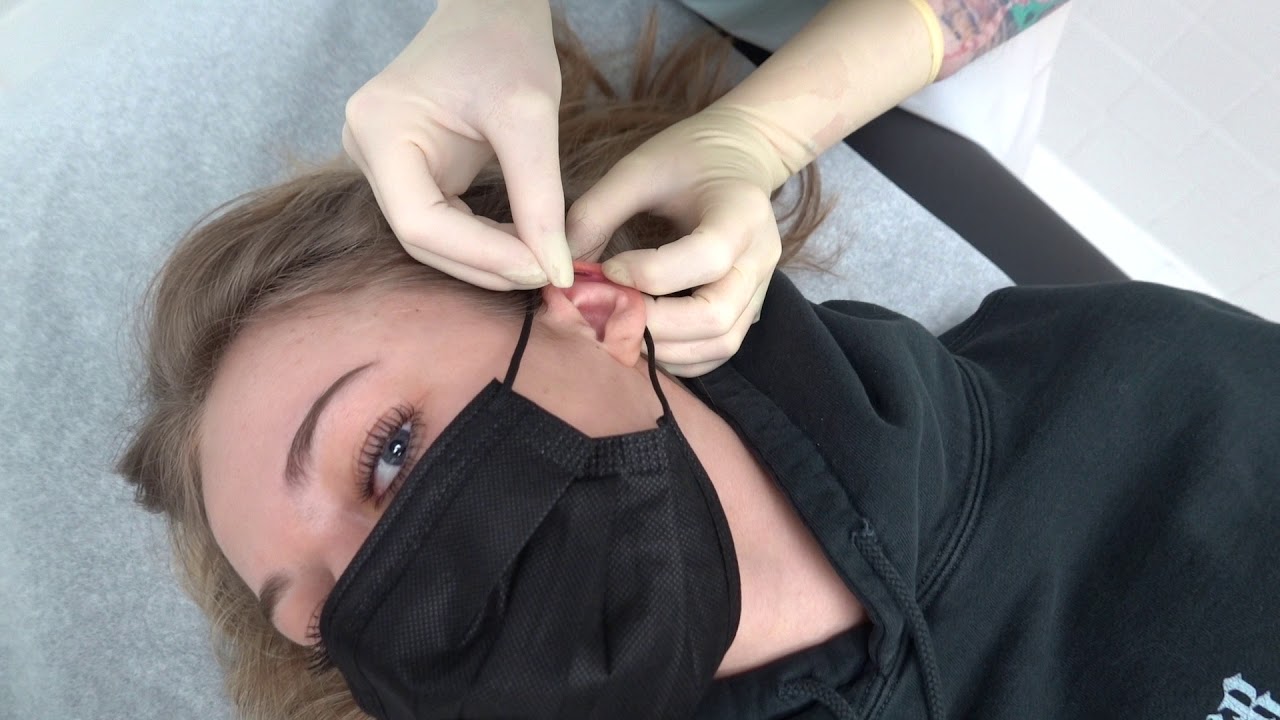 How Many Cartilage Piercings Can She Handle: Tommy T's Body Piercing Huntington Beach, CA