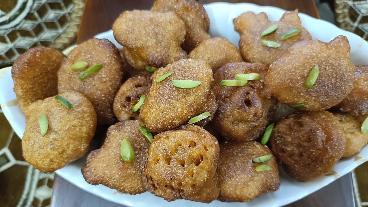 Gulgule recipe crispy and spongy gulgule tasty gulgule #recipe #gulgule #hyderabadi 